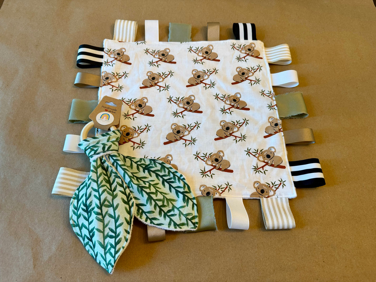 baby infant newborn babies baby gift baby shower gift baby boy baby girl baby shower gift ideas new mom mom-to-be expectant mom baby essentials baby must-haves bandana bib burp cloth sensory tag blanket blankie teether teething ring nursing feeding baby a
