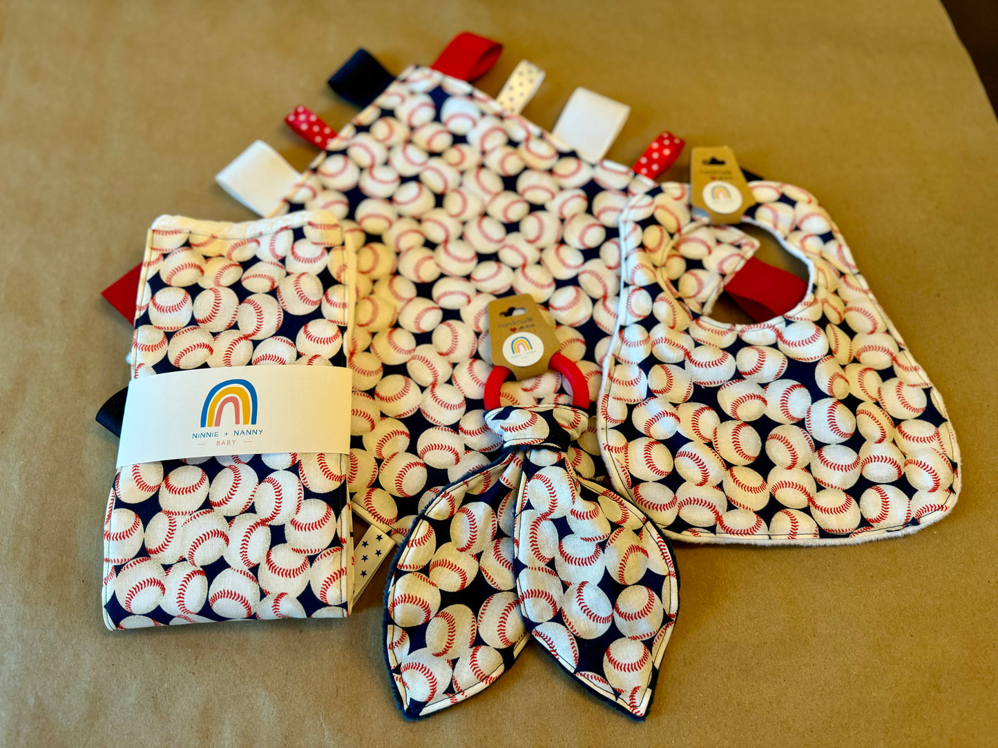 baby infant newborn babies baby gift baby shower gift baby boy baby girl baby shower gift ideas new mom mom-to-be expectant mom baby essentials baby must-haves bandana bib burp cloth sensory tag blanket blankie teether teething ring nursing feeding baby a