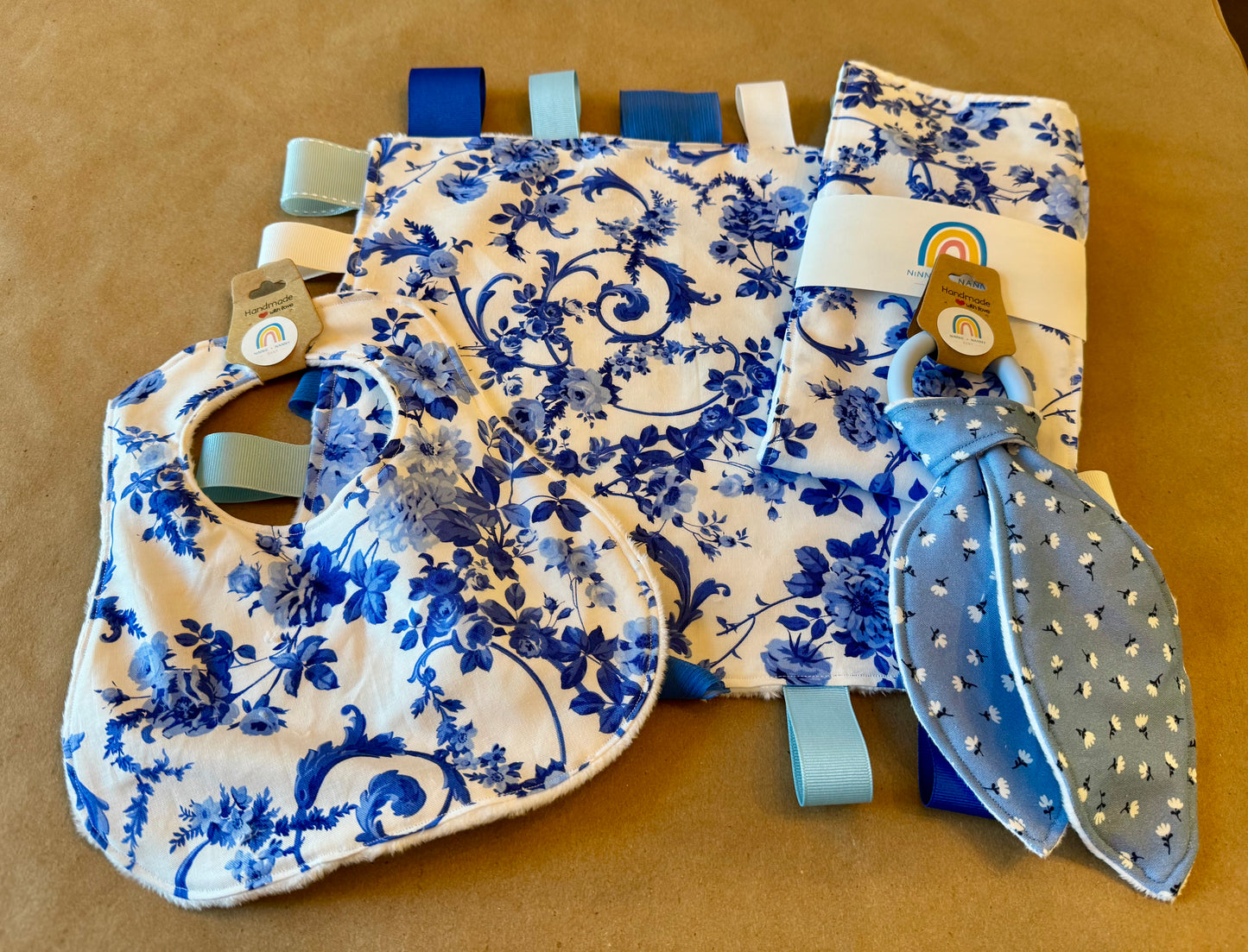baby infant newborn babies baby gift baby shower gift baby boy baby girl baby shower gift ideas new mom mom-to-be expectant mom baby essentials baby must-haves bandana bib burp cloth sensory tag blanket blankie teether teething ring nursing feeding baby a