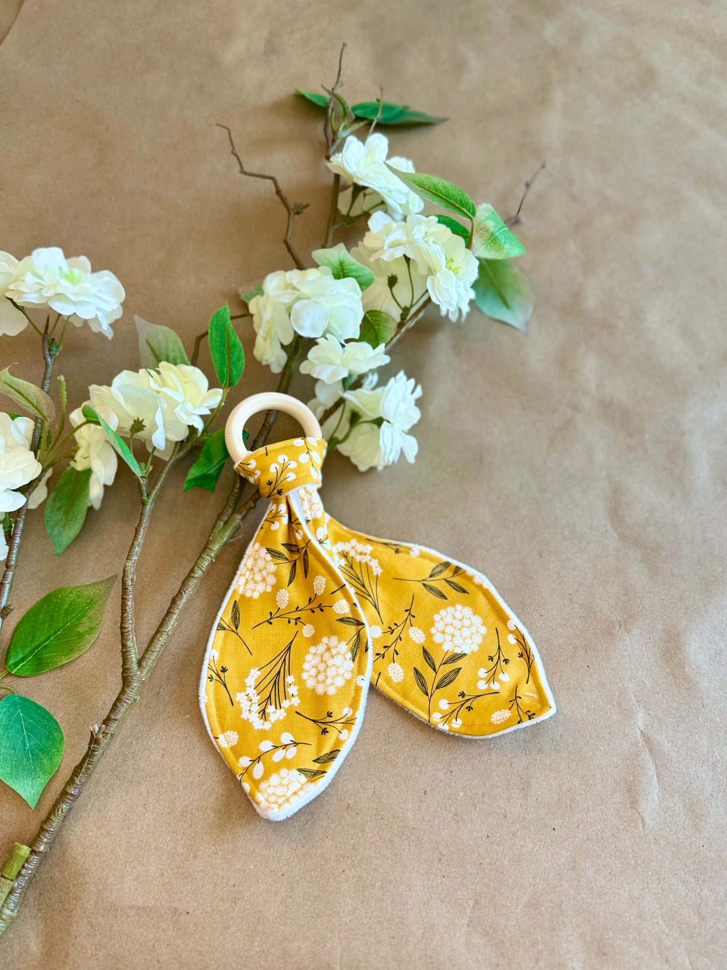 infant newborn baby girl flowers wildflowers mustard floral teether teething ring wood cotton minki minky