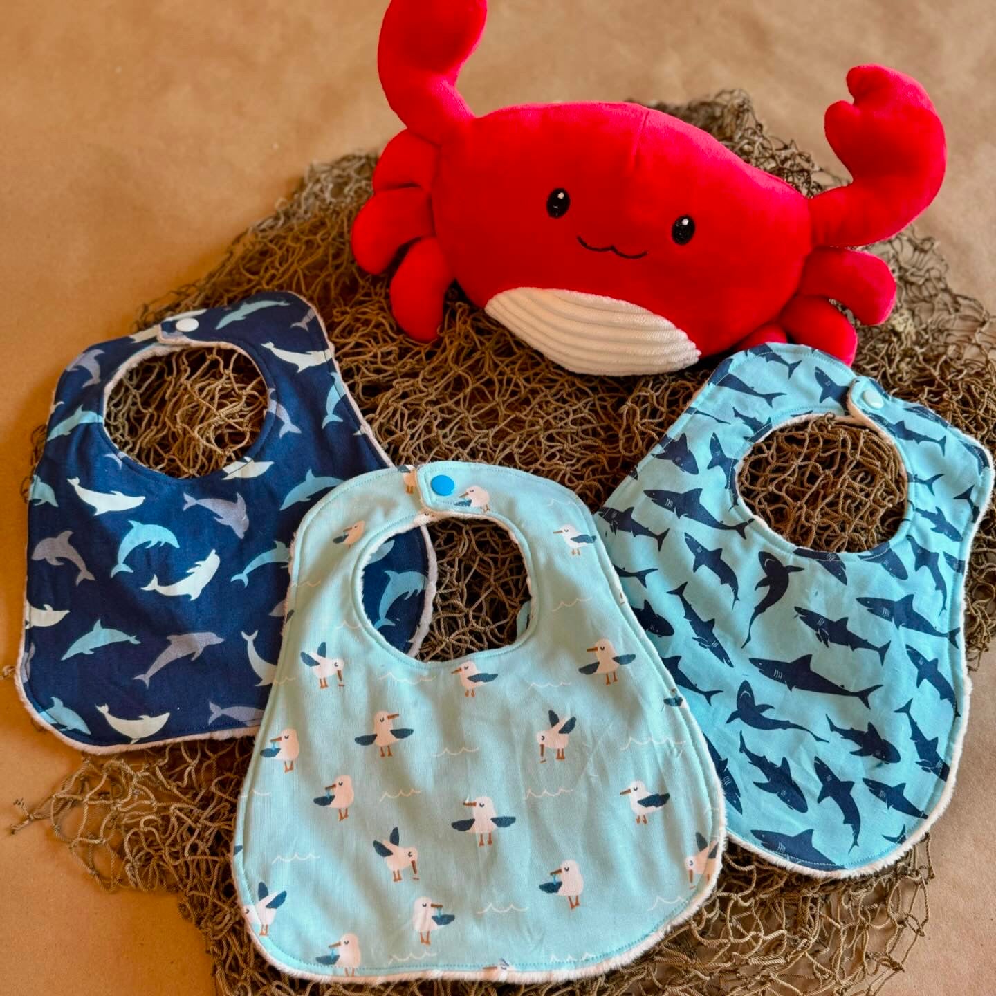 baby bib sharks dolphins seagulls sealife ocean cotton fabric minki minky dot fabric plastic snap button infant newborn