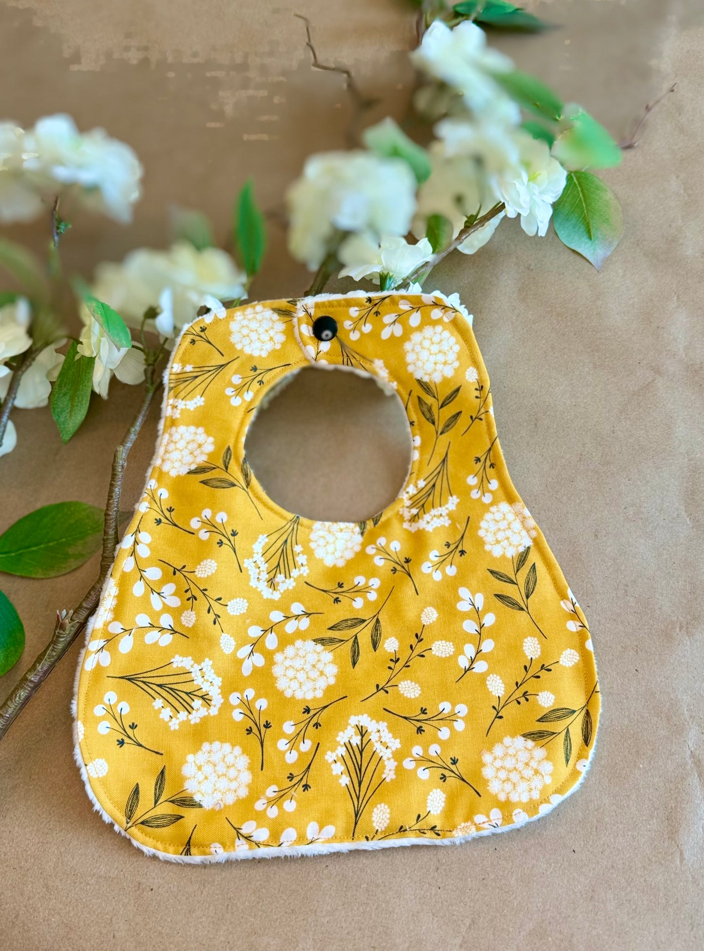 infant newborn baby girl flowers wildflowers mustard bib nursing cotton minki minky plastic snap button